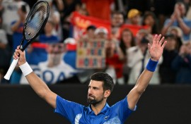 Novak Djokovic celebrates after victory against Portugal's Jaime Faria 