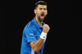 Novak Djokovic reacts after a point against Czech Republic's Tomas Machac 