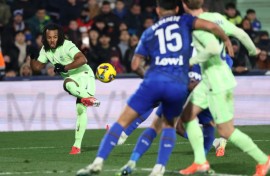 Barcelona's French defender Jules Kounde scored the opening goal in the draw against Getafe on Saturday