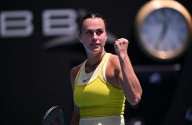 Aryna Sabalenka celebrates beating Mirra Andreeva