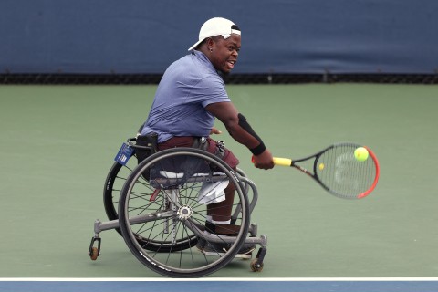 Donald Ramphadi strides to a tennis court baking in Pretoria heat, as he gets ready for a practice session on the Tuks High Performance Centre court.