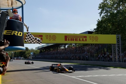 Max Verstappen takes the chequered flag for his first Italian Grand Prix victory at Monza, his 11th of a dominant 2022 season