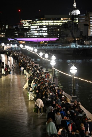 Mourners have been queuing through the night