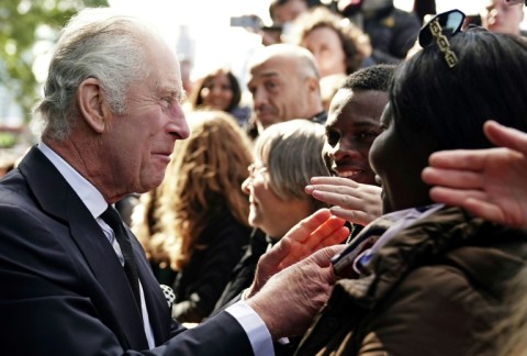 King Charles III met members of the public queuing to pay their respects to Queen Elizabeth II