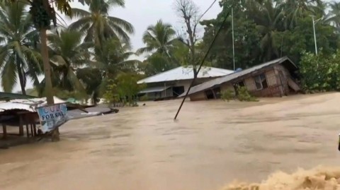 Flooding swamps villages after severe tropical storm hits Philippines