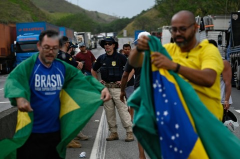 Fresh off a huge victory party that capped a remarkable political comeback, Brazil's president-elect veteran leftist Luiz Inacio Lula da Silva faces a messy, high-risk transition process