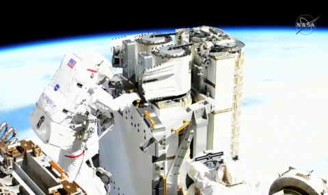 Pesquet, left, during a spacewalk outside the ISS in June, 2021