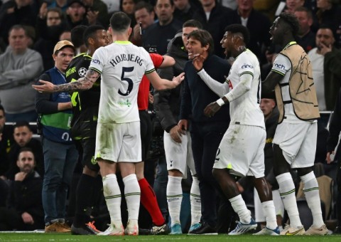 Antonio Conte (C) clashes with referee Danny Makkelie  during last Wednesday's draw