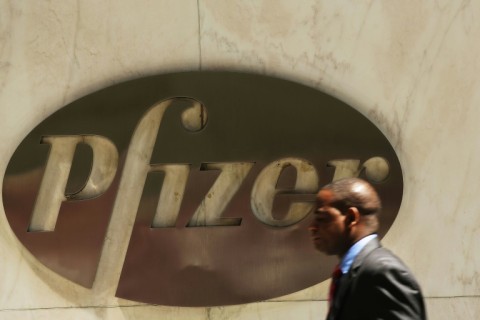 Pfizer lifted its full-year forecast for Covid-19 vaccine sales as it reported higher profits 