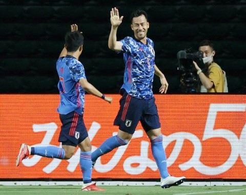 Japan captain Maya Yoshida (right) is hoping to lead his team into the World Cup quarter-finals for the first time in Qatar