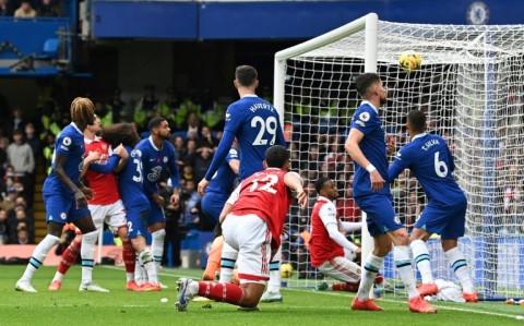 Arsenal defender Gabriel Magalhaes scores against Chelsea