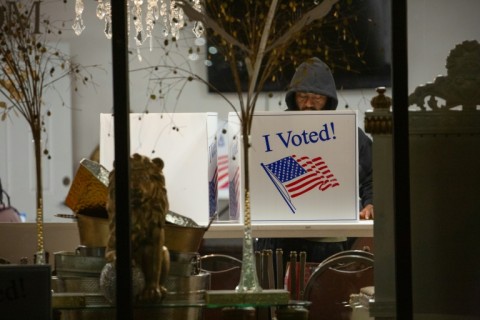 A voter casts his ballot  during the US midterm elections in Pittsburgh, Pennsylvania, on November 8, 2022