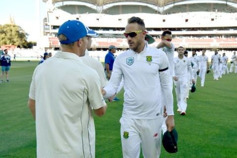 Happier times - Faf du Plessis, then South Africa's captain, (C) shakes hands with Australia' David Warner (L) after the third Test in Adelaide in November 2016. Du Plessis labelled Warner a 'bully' for his role in a dressing room row two years later