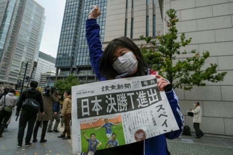 Newspapers printed special morning editions to mark the victory