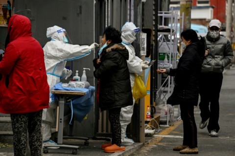 China's nationwide loosening of Covid restrictions includes scaling down lockdowns and allowing people with non-severe Covid to isolate at home