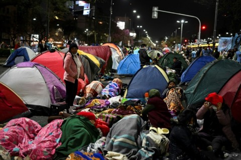 Argentina's World Cup success is a distriction from the country's very real problems, including an economic crisis which in September led thousands into the streets of Buenos Aires demanding decent jobs and livable wages