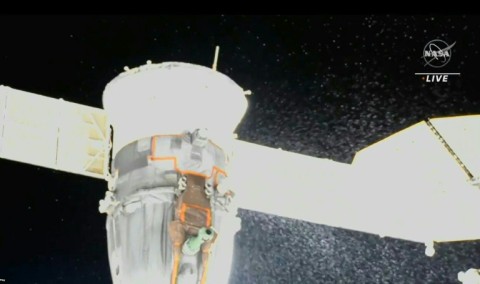 A video grab from a NASA feed shows a coolant leak from the Soyuz MS-22 spacecraft