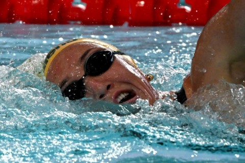 Australia's Lani Pallister became the furst swimmer to win the 400-800-1500m freestyle at a short course world championships  