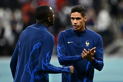 France defender Raphael Varane (right) sat out training two days before the World Cup final