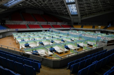 Beds for patients are seen in partitioned rooms at a makeshift fever clinic at a stadium amid the Covid-19 pandemic in Beijing on December 20, 2022.