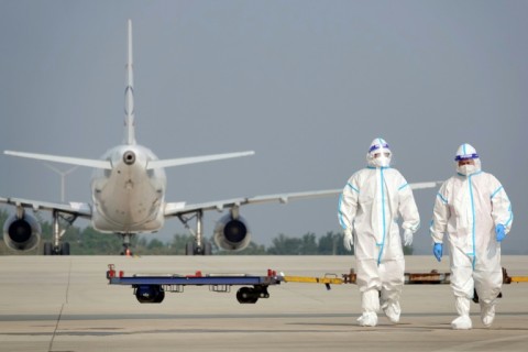 Online searches in China for flights abroad surged on the news of the quarantines being lifted