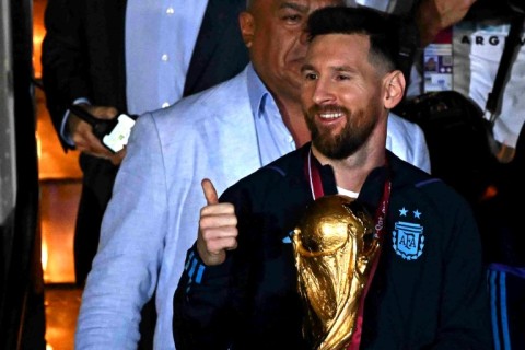 Lionel Messi (C) has been in Argentina since winning the World Cup