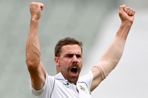 South Africa's Anrich Nortje celebrates dismissing Australia's David Warner