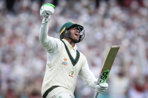 Australia’s Usman Khawaja celebrates reaching his century during day two of the third cricket Test match between Australia and South Africa at the Sydney Cricket Ground (SCG) in Sydney