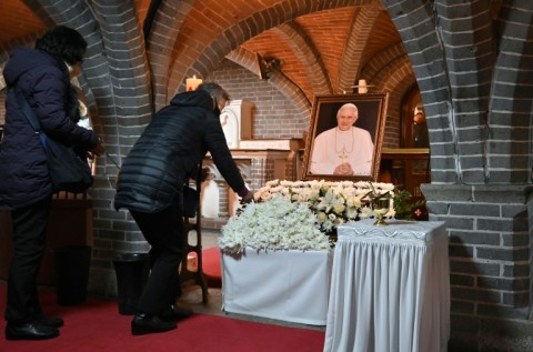 Catholic worshippers pay their respects  at the Myeongdong Cathedral in Seoul 