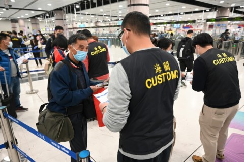 Up to 50,000 Hong Kong residents are now able to cross the border daily at three land checkpoints after registering online