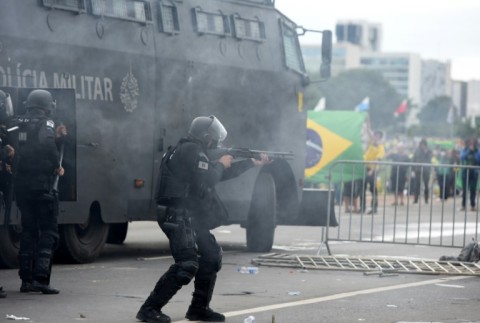 Security forces used tear gas, stun grenades and water cannon to fight back the rioters in Brasilia