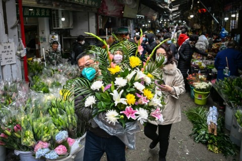 Wuhan, the Chinese city synonymous with with Covid-19, springs back to life for Lunar New Year's Eve, but many are mourning family members lost during the pandemic