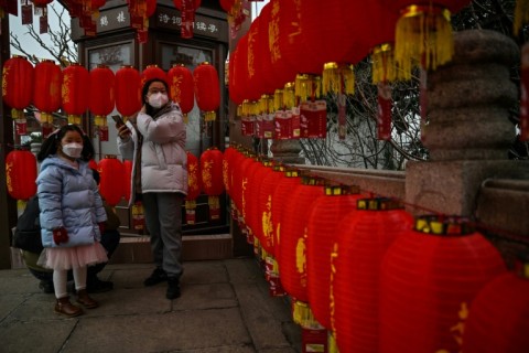 Wuhan, the Chinese city synonymous with with Covid-19, springs back to life for Lunar New Year's Eve, but many are mourning family members lost during the pandemic