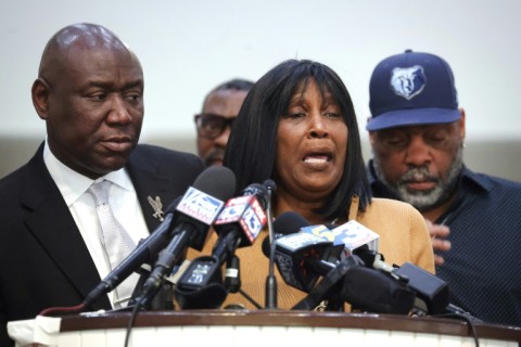 Flanked by civil rights attorney Ben Crump (L) and her husband Rodney Wells, RowVaughn Wells, mother of Tyre Nichols, speaks during a press conference