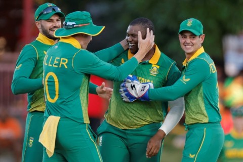 Man of the match: South Africa's Sisanda Magala is congratulated by teammates after the dismissal of England's Harry Brook 