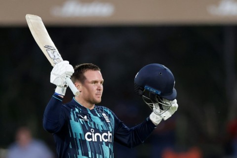 Back on form: England's Jason Roy celebrates after scoring a century 