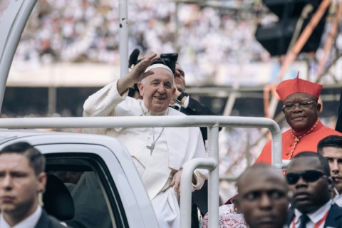 The 86-year-old Argentine pontiff arrived at Kinshasa's Martyrs' stadium on his popemobile