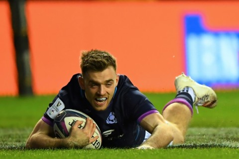 Scotland's Ben White scores a try against England at Murrayfield in 2022