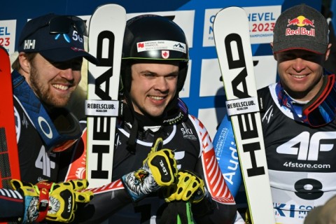 Norway's Aleksander Aamodt Kilde (L), Canada's James Crawford and France's Alexis Pinturault