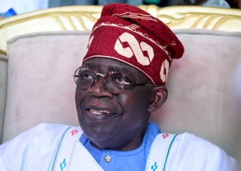 Presidential candidate of All Progressives Congress (APC) Bola Tinubu looks on as he attends a party campaign rally at Teslim Balogun Stadium in Lagos, on November 26, 2022.