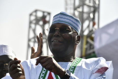 Candidate of the opposition Peoples Democratic Party (PDP) Atiku Abubakar gestures during a campaign rally in Kano, northwest Nigeria, on February 9, 2023.