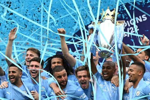 Manchester City lift the Premier League trophy