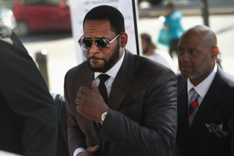 R&B singer R. Kelly, shown here attending a hearing in 2019, was sentenced to 20 years for child sex crimes he was convicted of in Chicago -- he will serve an extra year in prison on top of an earlier 30-year sentence