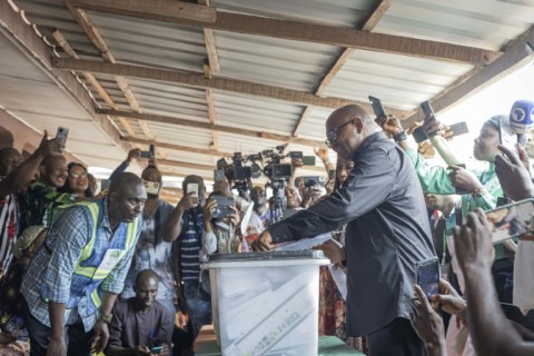 Labour Party presidential candidate Peter Obi (C-R) has attracted many young voters