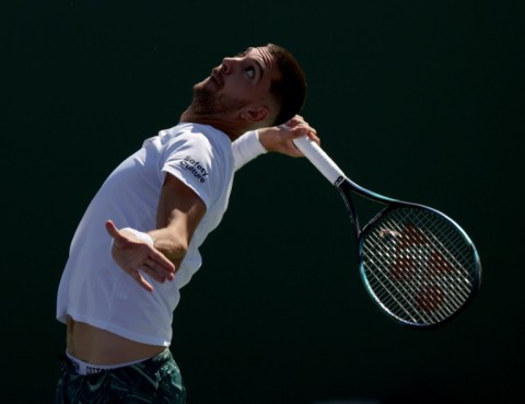 Australian Thanasi Kokkinakis of Australia on the way to a straight sets victory over American Brandon Holt in the first round at Indian Wells