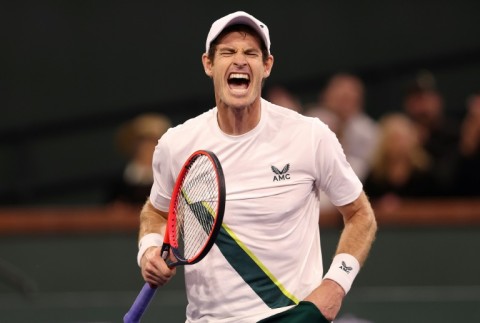 Britain's Andy Murray celebrates his first round victory over Tomas Etcheverry of Argentina at the Indian Wells WTA and ATP Masters