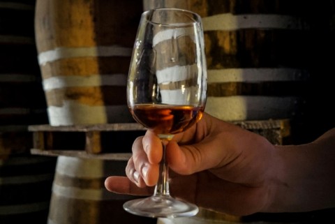 Cuban rum master Cesar Marti tests the density of one of the rums he makes, at the Central Rum Factory in the town of Santo Domingo, Villa Clara Province, some 270 kilometres southeast of Havana, Cuba