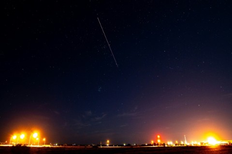 A long exposure shows the light trail of a re-entry capsule carrying samples from an asteroid on December 6, 2020