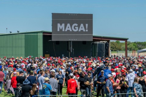 Crowds gather at the Waco Regional Airport ahead of former president Donald Trump's arrival on March 25, 2023 in Waco, Texas