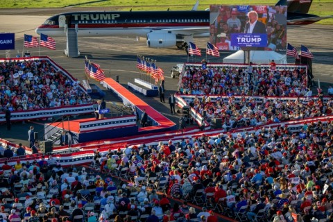 Former US president Donald Trump's plane served as part of the backdrop for his rally in Waco, Texas on March 25, 2023